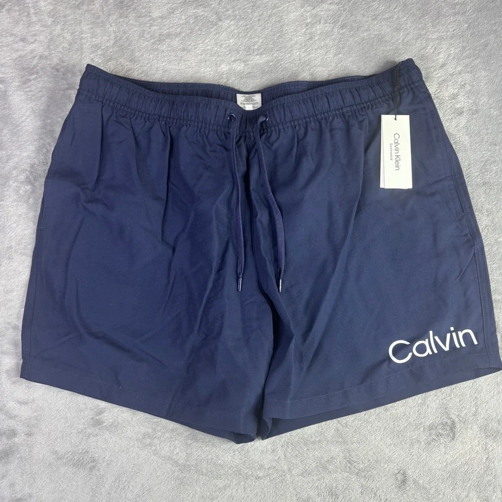 Calvin Klein Swim Trunks Men XXL Navy Blue Logo Graphic UPF 40+ CB3DP009 NWT